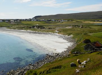 File:Sandur village and the sandy beach with dunes Sandoy Faroe Islands.JPG  - Wikimedia Commons