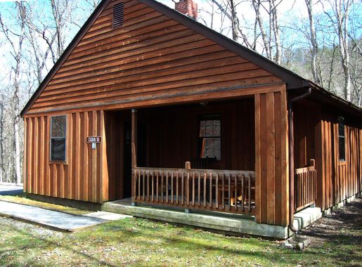 File:Cabin 16 allows six, sleeps six. This two-bedroom cinderblock with  cedar siding cabin has