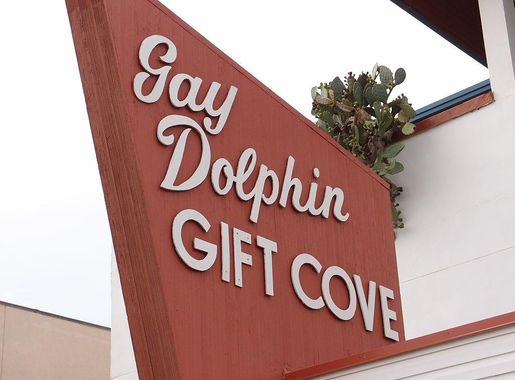 File:Gay Dolphin Gift Cove sign.jpg - Wikimedia Commons