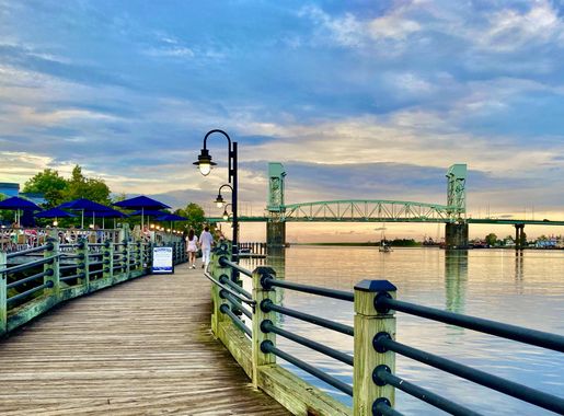 File:Wilmington, NC Riverwalk and Cape Fear Memorial Bridge at Sunset.jpg -  Wikimedia Commons