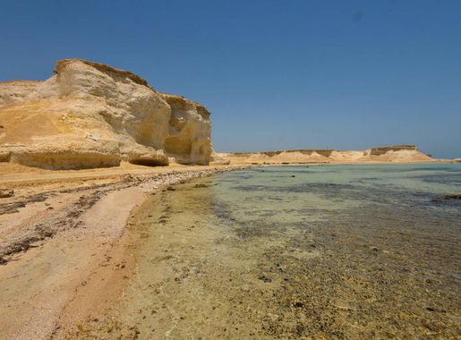 File:Sandstone cliffs in Ras Abrouq.jpg - Wikimedia Commons