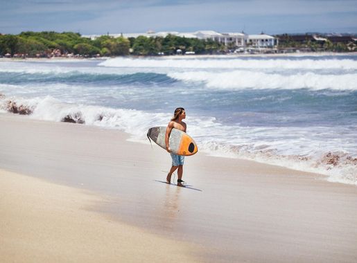 File:Surfer at Kuta Beach, Bali (Unsplash).jpg - Wikimedia Commons