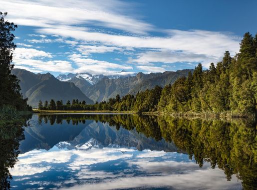 File:Lake Matheson With A View Of Mt Cook New Zealand (150681179).jpeg -  Wikimedia Commons