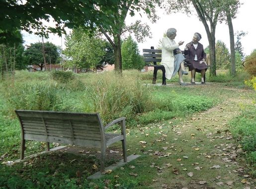 File:Grounds for Sculpture Two Sculptures Talking on bench.JPG - Wikimedia  Commons