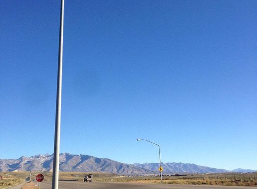 File:2014-10-05 16 14 16 Street light illuminated during the day along  Nevada State Route 227 (Lamoille Highway) in Spring Creek, Nevada.JPG -  Wikimedia Commons