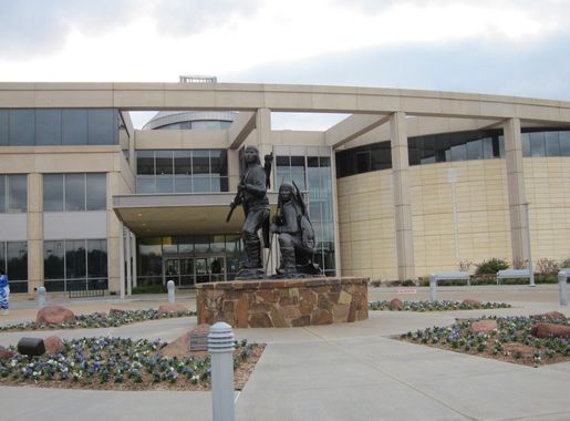 File:A statue at the front entrance of the Oklahoma History Center in  Oklahoma City, Oklahoma (ad21b25f-b2e3-4fe7-9eab-83bb424897a5).JPG -  Wikimedia Commons