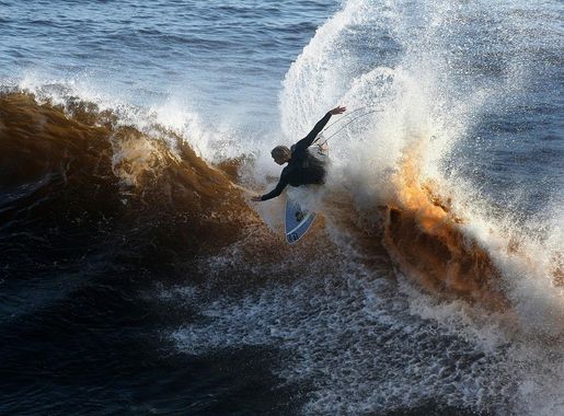 File:A surfer at the wave.jpg - Wikimedia Commons