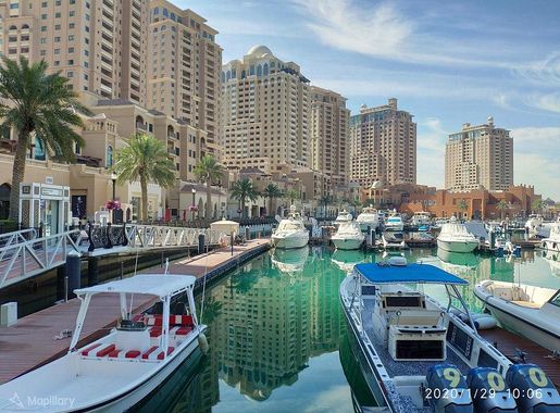 File:Reflective waters at The Pearl Marina.jpg - Wikimedia Commons