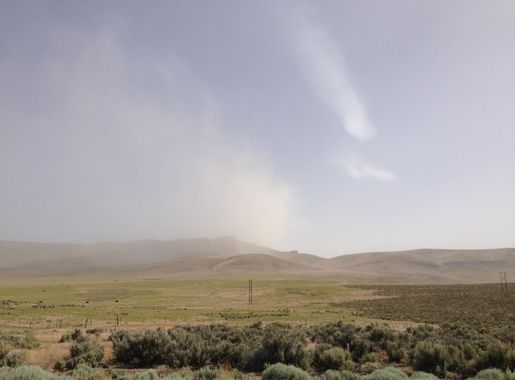File:2014-06-12 16 41 49 Blowing dust south of Thacker Pass along Nevada  State Route 293 (Kings River Road) 3.3 miles east of the western  terminus.JPG - Wikimedia Commons