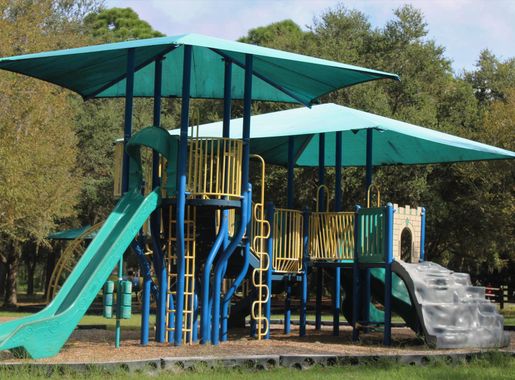 File:Canopied playground slide at John S Taylor Park.JPG - Wikimedia Commons