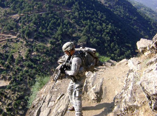 File:U.S. Army Staff Sgt. Clinton L. Romesha patrols near Combat Outpost  Keating in Kamdesh, Nuristan province, Afghanistan, July 27, 2009.jpg -  Wikimedia Commons
