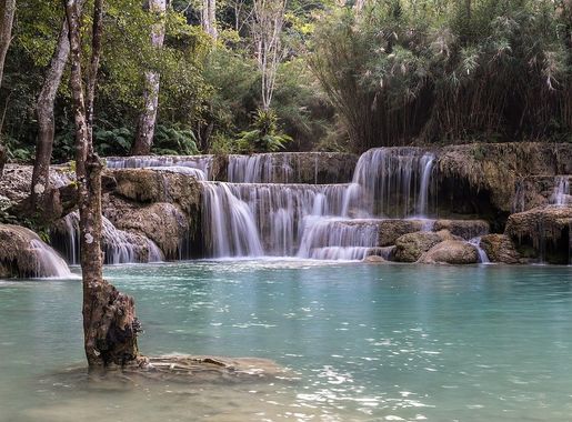 File:Kuang Si Falls with submerged tree in turquoise water near Luang  Prabang Laos.jpg - Wikimedia Commons