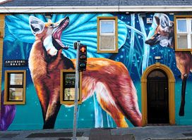 Mural "Maned Wolves" by Nina Valkhoff for Waterford Walls