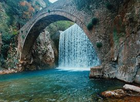 Stone bridge and waterfall of Palaiokarya