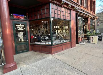 new-york/saratoga-springs/landmark/gold-tiger-tattoo