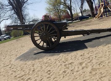 colorado/fort-collins/landmark/cannon-in-city-park-playground-fort-collins