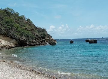 curacao/caracas-bay/landmark/tugboat-beach