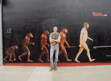 united-kingdom/liverpool/baltic-triangle/landmark/evolution-of-man-mural-by-paul-curtis