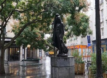 france/paris/landmark/statue-l-homme-au-bras-leve