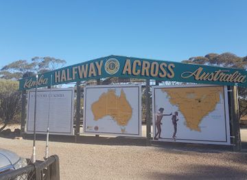 australia/north-east-south-australia/landmark/halfway-across-australia-sign