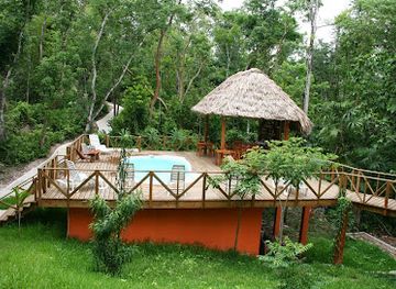 belize/caracol/landmark/amber-sunset-jungle-resort