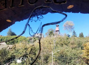 new-mexico/ruidoso/landmark/spotted-dog-tattoo