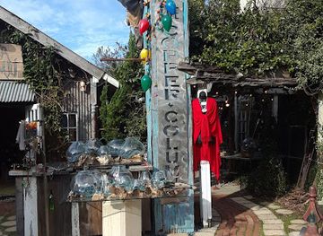 alabama/fairhope/landmark/the-copper-column-llc