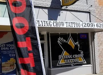california/manteca/landmark/flying-crow-tattoo