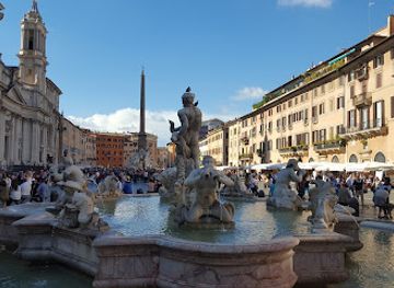 italy/rome/piazza-navona/landmark/fountain-of-the-moro