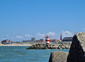 netherlands/scheveningen-beach/landmark/green-lighthouse-southern-pier