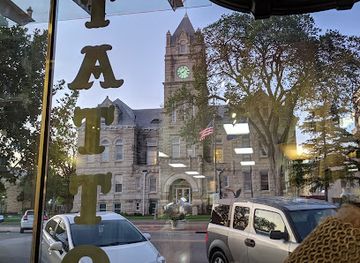 kansas/manhattan/landmark/syndicate-tattoo