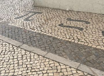 portugal/faro/landmark/calcada-com-o-simbolo-pi