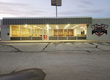 oklahoma/moore/landmark/twisted-axes-throw-house