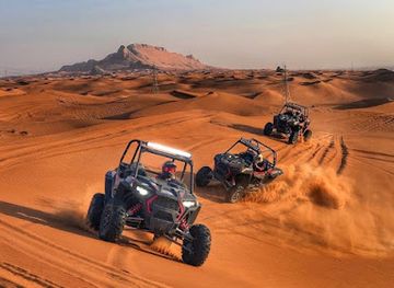 united-arab-emirates/dubai-desert-conservation-reserve/landmark/desert-safari-dubai-tripscape-adventures-dubai-tour-packages-theme-parks-tickets-city-tours