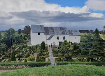 Jelling Mounds, Runic Stones and Church