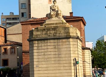france/toulouse/saint-cyprien/landmark/porte-saint-cyprien-statue-de-toulouse