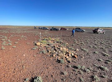 australia/north-east-south-australia/landmark/northern-territory-south-australia-00-miles-border-post