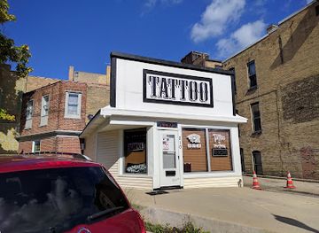 illinois/elgin/landmark/bighead-tattoo