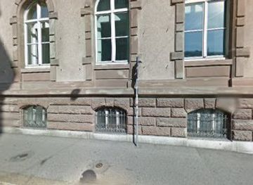 switzerland/basel/landmark/basilia-basiliskenrelief-alte-gewerbeschule