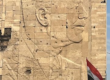 iraq/babel/landmark/the-tyrant-mural