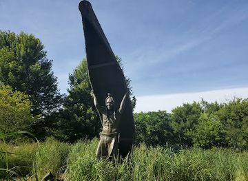 ohio/grand-river-valley/landmark/native-american-carrying-a-canoe