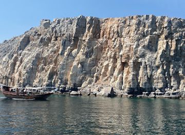 oman/musandam-governorate/landmark/the-dolphin-travel-tourism