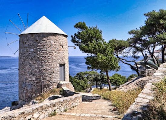 greece/attica/landmark/sophia-s-windmill-and-boy-and-dolphin-movie-statue
