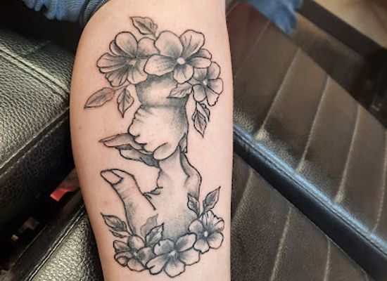 nebraska/north-platte/landmark/laughing-buddha-body-art