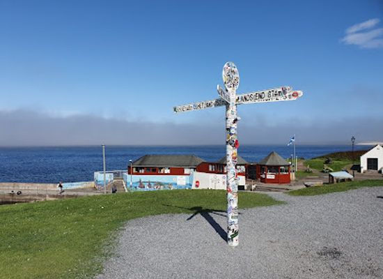 united-kingdom/caithness/landmark/john-o-groats-signpost