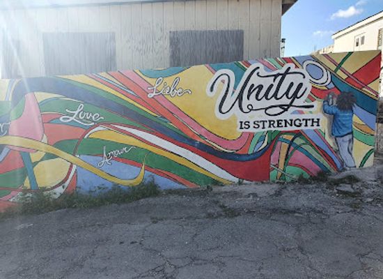 curacao/willemstad/landmark/unity-is-strength-wall