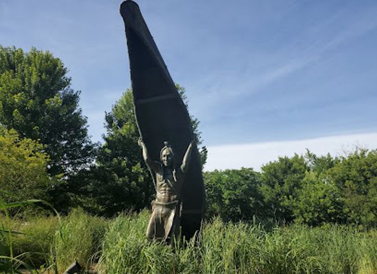 ohio/grand-river-valley/landmark/native-american-carrying-a-canoe
