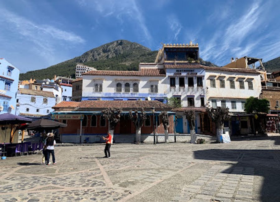 Discover the vibrant charm of Plaza Uta el Hamman in Chefchaouen, where rich culture, stunning architecture, and delicious Moroccan cuisine await every traveler.