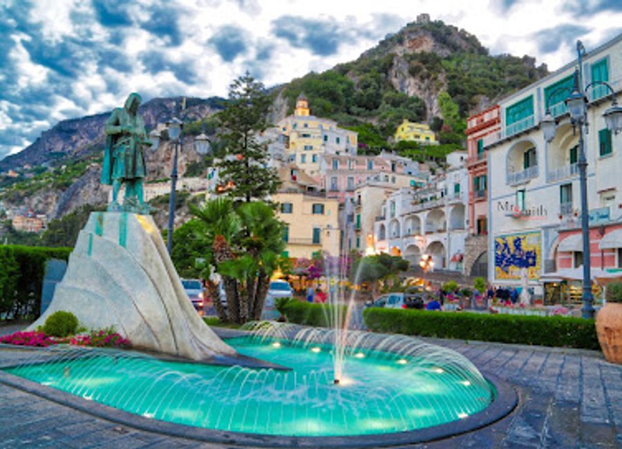 Discover the Statue Dedicated to Flavio Gioia in Amalfi, a stunning tribute to maritime history and a picturesque spot to enjoy local culture.