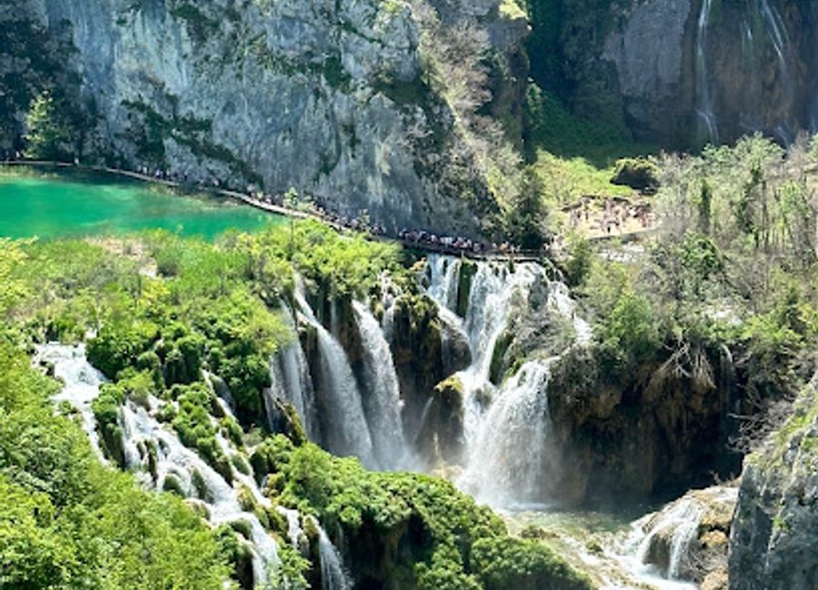Experience the breathtaking beauty of Plitvice Lakes National Park from the Plitvicka Jezera Waterfall viewpoint. A natural wonder in Croatia.